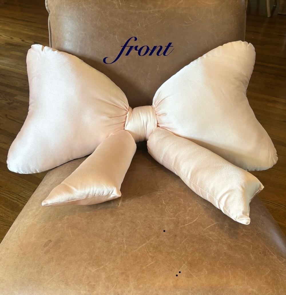 URBAN OUTFITTERS HOME light pink satin “BOW” throw pillow